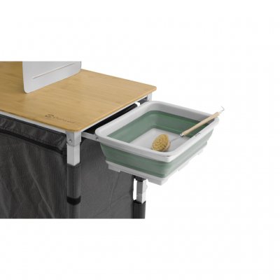 Køkkenbordet har en udtræksholder til en tallerken eller affaldspose